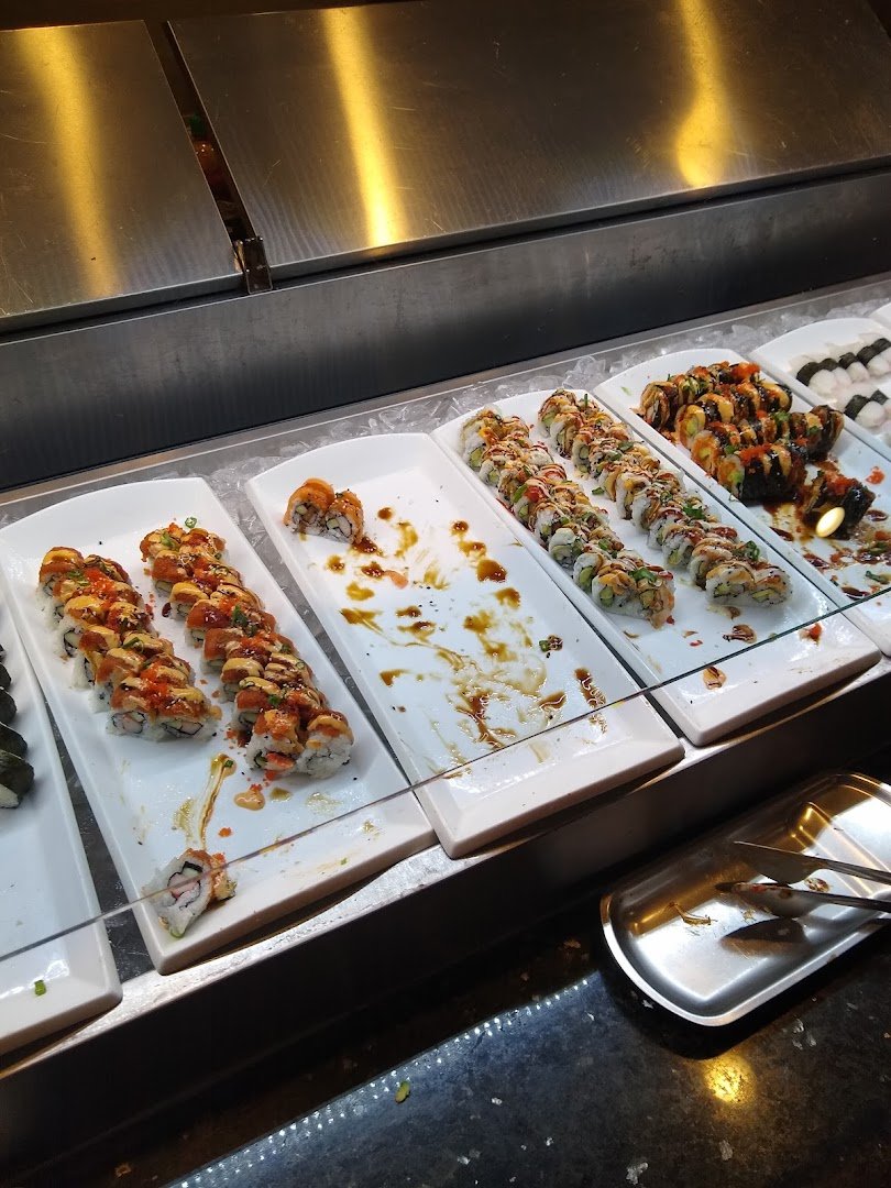 Sushi and grilled items on a buffet line
